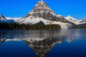 A beautiful photograph of two medicine lake in Glacier National Park